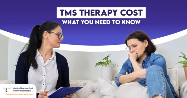TMS Therapy Cost What You Need to Know-01 A therapist consulting with a patient about TMS therapy cost and treatment options at Central Connecticut Behavioral Health.