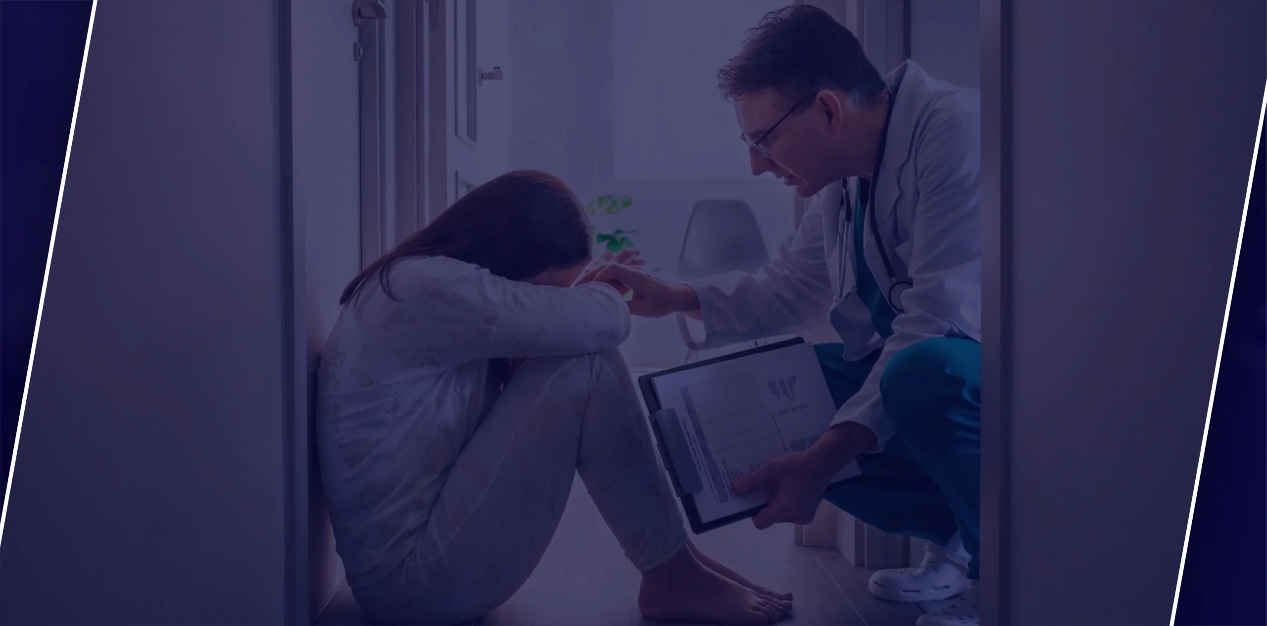 A clinician comforting a patient during a difficult moment